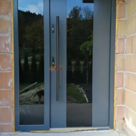 Drzwi drewniane ,dębowe , ocieplane . 